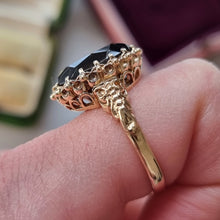 Load image into Gallery viewer, Vintage 9ct Yellow Gold Smokey Quartz Dress Ring modelled on the index finger, viewed from the side
