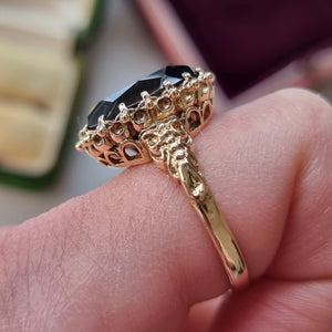 Vintage 9ct Yellow Gold Smokey Quartz Dress Ring modelled on the index finger, viewed from the side