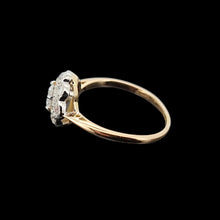 Load image into Gallery viewer, Gold ring with diamonds on a black background

