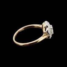 Load image into Gallery viewer, Gold ring with diamonds on a black background
