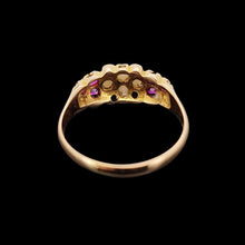Load image into Gallery viewer, Gold ring with pearls, diamonds and rubies on a black background
