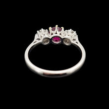 Load image into Gallery viewer, Rear view of a three stone ring on a black background
