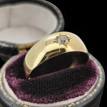 Load image into Gallery viewer, A solitaire old cut diamond gypsy set ring in yellow gold, in a ring box, on a black background
