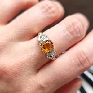 18ct Gold Topaz and Baguette-Cut Diamond Ring modelled