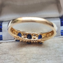 Load image into Gallery viewer, Vintage 18ct Gold Sapphire and Diamond Seven Stone Ring behind head
