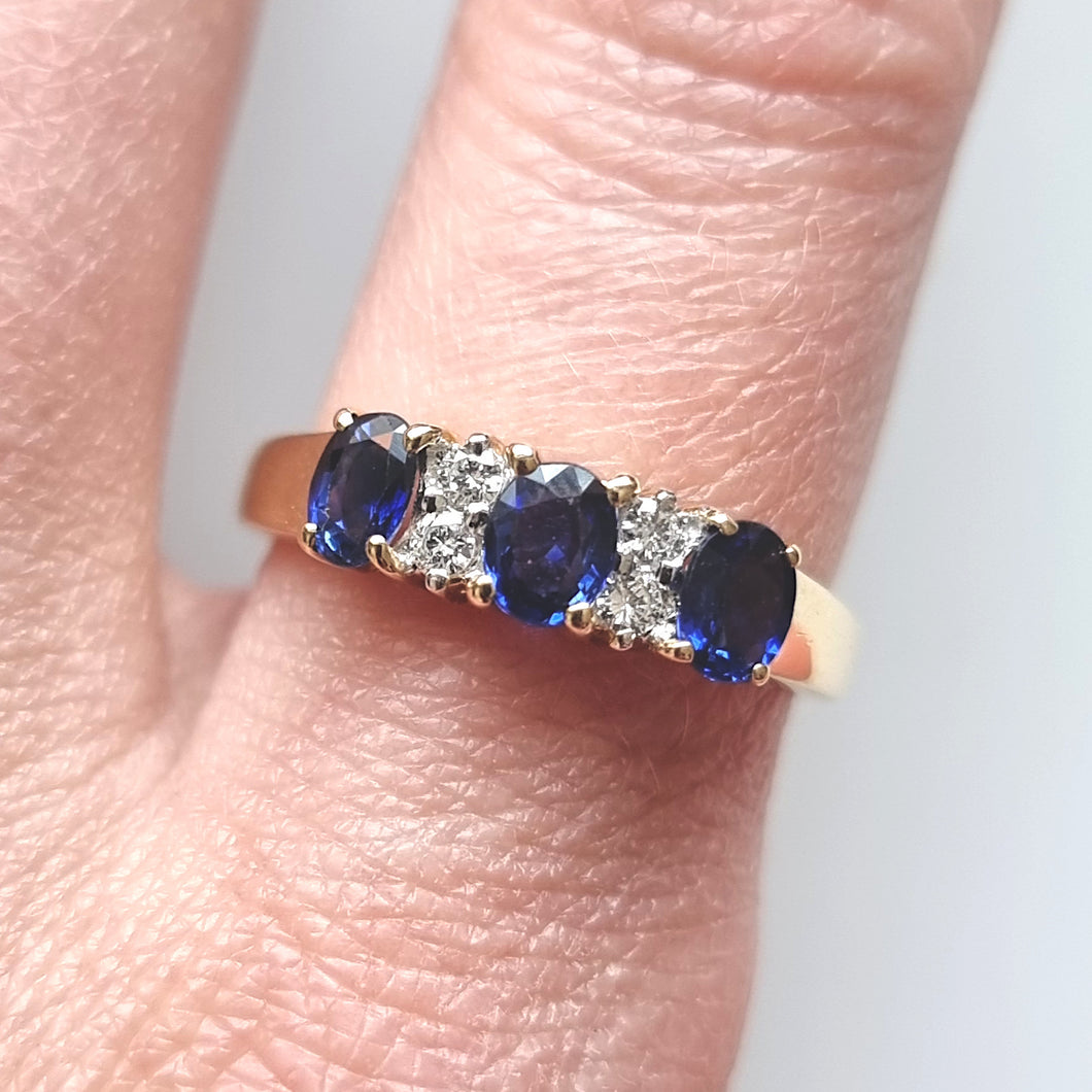 Vintage 18ct Gold Sapphire and Diamond Seven Stone Ring modelled