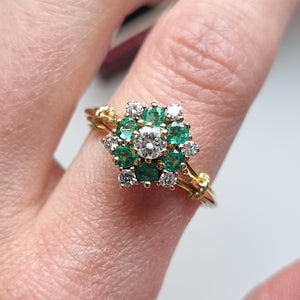 Vintage 18ct Gold Emerald and Diamond Cluster Ring modelled