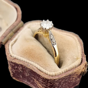 Vintage 18ct Gold and Platinum Diamond Ring with Diamond Shoulders, 0.33ct in an antique ring box, on a black background