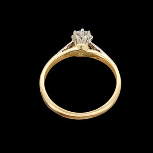 Vintage 18ct Gold and Platinum Diamond Ring with Diamond Shoulders, 0.33ct from behind, on a black background