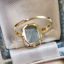 Load image into Gallery viewer, Vintage 18ct Gold Aquamarine and Diamond Cluster Ring behind head

