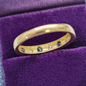 Vintage 18ct Yellow Gold Sapphire and Diamond Half Eternity Ring behind head