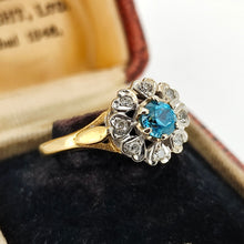 Load image into Gallery viewer, A blue zircon and diamond flower cluster ring in yellow and white gold, in an antique ring box
