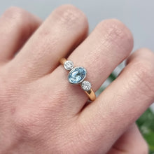Load image into Gallery viewer, Vintage 18ct Gold Aquamarine and Diamond Three Stone Ring modelled
