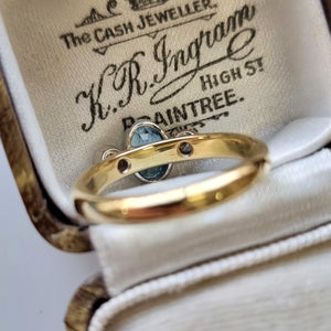 Vintage 18ct Gold Aquamarine and Diamond Three Stone Ring behind