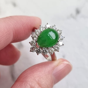 Vintage Platinum Jade 2.39ct and Diamond 1.03ct Cluster Ring in hand