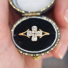 Load image into Gallery viewer, Gold ring with diamonds in a black and gold box held by a hand
