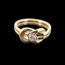 Load image into Gallery viewer, Gold ring with a diamond on a black background
