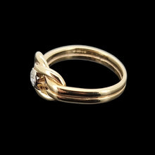 Load image into Gallery viewer, Gold ring with a diamond on a black background
