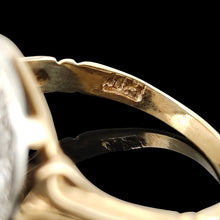 Load image into Gallery viewer, A close-up of a stamp in a yellow gold ring shank
