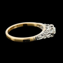 Load image into Gallery viewer, An old cut diamond solitaire ring in gold and platinum, on a black background
