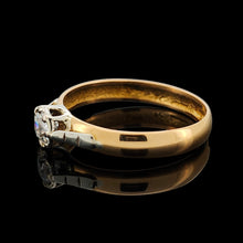 Load image into Gallery viewer, A single stone old cut diamond ring on a yellow gold band with white gold shoulder details
