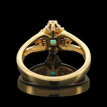 Load image into Gallery viewer, An emerald and diamond compass set cluster ring in yellow gold with split shoulders, with a black background
