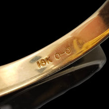 Load image into Gallery viewer, Close-up of an 18K stamp inside a yellow gold ring shank

