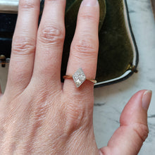 Load image into Gallery viewer, A rhombus shaped four stone diamond ring in yellow gold and platinum, modelled on a hand
