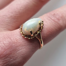 Load image into Gallery viewer, Vintage 18ct Gold Pear Shaped Opal Ring modelled
