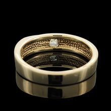 Load image into Gallery viewer, A yellow gold solitaire square cut diamond band, on a black background

