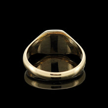 Load image into Gallery viewer, A yellow gold and platinum signet ring, on a black background
