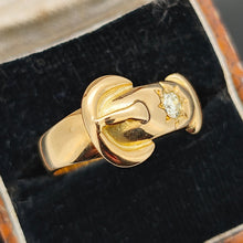 Load image into Gallery viewer, A yellow gold buckle band ring with two diamonds, in an antique ring box
