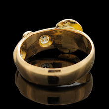 Load image into Gallery viewer, A yellow gold buckle band ring with two diamonds
