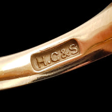 Load image into Gallery viewer, Close-up of a H.C&amp;S maker's stamp inside a yellow gold ring shank
