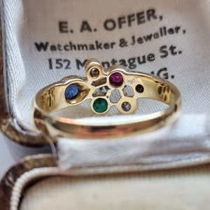Vintage 14ct Gold Multi-Gem and Diamond Ring behind head