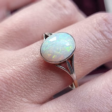 Load image into Gallery viewer, Opal solitaire ring modelled on a finger
