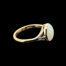 Load image into Gallery viewer, Gold ring with an opal on a black background
