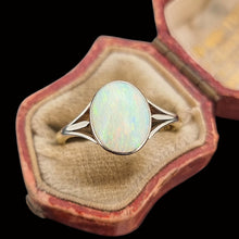 Load image into Gallery viewer, Opal ring in a decorative antique ring box on a black background
