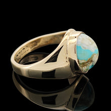 Load image into Gallery viewer, A yellow gold oval turquoise solitaire ring, on a black background
