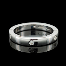 Load image into Gallery viewer, A round diamond set wedding band in white gold, on a black background
