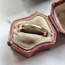 Load image into Gallery viewer, Gold ring in an open antique ring box on a white background
