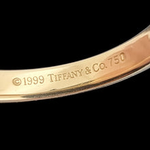Load image into Gallery viewer, Close-up of Tiffany &amp; Co. stamp, 1999 date and 750 stamp inside a gold ring shank
