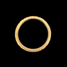 Load image into Gallery viewer, A yellow gold floral patterned wedding band ring
