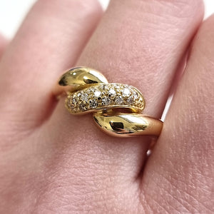 18ct Yellow Gold Brilliant Cut Diamond Twist Ring modelled