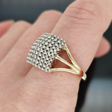 Load image into Gallery viewer, A square shaped diamond cluster ring yellow and white gold, modelled on a hand
