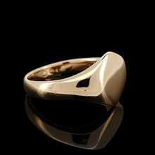Load image into Gallery viewer, A gold hexagonal shaped signet ring, on a black background
