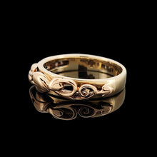 Load image into Gallery viewer, A yellow gold leaf motif band ring, on a black background
