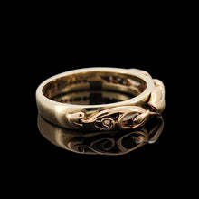 Load image into Gallery viewer, A yellow gold leaf motif band ring, on a black background
