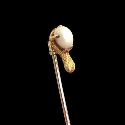Antique 15ct and 18ct Gold Bird's Egg Tie/Stick Pin on a black background