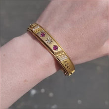 Load and play video in Gallery viewer, Edwardian 9ct Gold Ruby, Diamond &amp; Seed Pearl Bangle
